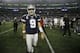Dallas Cowboys quarterback Tony Romo (9) walks off the field after an NFL football game against the Oakland Raiders Thursday, Nov. 28, 2013, in Arlington, Texas. The Cowboys won 31-24. (AP Photo/Tim Sharp)