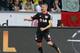 Leverkusen's Lars Bender celebrates his side's opening goal during a German Bundesliga soccer match between Bayer 04 Leverkusen and Borussia Dortmund in Leverkusen, Germany, Saturday, April 26, 2014. (AP Photo/Michael Probst)