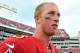 TAMPA, FL - DECEMBER 8: Quarterback Mike Glennon #8 of the Tampa Bay Buccaneers leaves the field after play against the Buffalo Bills December 8, 2013 at Raymond James Stadium in Tampa, Florida. The Buxs won 27 - 6. (Photo by Al Messerschmidt/Getty Images)