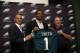 Newly-drafted Philadelphia Eagles' Marcus Smith, center, poses with team president Don Smolenski, left, and head coach Chip Kelly before an NFL football news conference at the team's practice facility, Friday, May 9, 2014, in Philadelphia. Smith was selected in the first round, 26th overall, by the Philadelphia Eagles in the NFL draft on Thursday, May 8, 2014. (AP Photo/Matt Slocum)