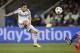 Chelsea's Eden Hazard takes a shot during the Champions League quarterfinal first leg soccer match between PSG and Chelsea, at the Parc des Princes stadium, in Paris, Wednesday, April 2, 2014. (AP Photo/Christophe Ena)
