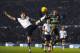 DERBY, ENGLAND - FEBRUARY 10: Craig Forsyth of Derby County battles with Jermaine Jenas of Queens Park Rangers during the Sky Bet Championship match between Derby County and Queens Park Rangers on February 10, 2014 in Derby, England. (Photo by Laurence Griffiths/Getty Images)