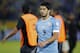 FILE - In this Friday, Oct. 11, 2013 file photo, Uruguay's Luis Suarez walks off the pitch at the end of a 2014 World Cup qualifying soccer game against Ecuador in Quito, Ecuador. Uruguay striker Luis Suarez has undergone keyhole surgery on his knee and is expected to recover in time for the World Cup. The mother of the 27-year-old Liverpool striker says he had surgery Thursday to repair damage to his meniscus. Sandra Diaz tells The Associated Press that the surgery was successful and that he is expected to recover in 2-3 weeks. Uruguay plays its first match at the World Cup against Costa Rica on June 14. The team will then face England on June 19 and Italy on June 24. (AP Photo/Martin Mejia, file)