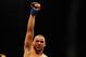 Jul 21, 2012; Calgary, AB, CANADA; Renan Barao celebrates defeating Urijah Faber (not pictured) in the interim bantamweight title bout of UFC 149 at the Scotiabank Saddledome. Mandatory Credit: Anne-Marie Sorvin-USA TODAY Sports