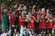 JOHANNESBURG, SOUTH AFRICA - JULY 11: David Villa and Sergio Ramos of Spain lift the World Cup trophy as the Spain team celebrate victory following the 2010 FIFA World Cup South Africa Final match between Netherlands and Spain at Soccer City Stadium on July 11, 2010 in Johannesburg, South Africa. (Photo by Jasper Juinen/Getty Images)