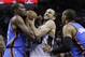 San Antonio Spurs' Manu Ginobili, center, tries to drive between Oklahoma City Thunder's Kevin Durant, left, and Russell Westbrook during the first half of Game 2 of the Western Conference finals NBA basketball playoff series, Wednesday, May 21, 2014, in San Antonio. (AP Photo/Eric Gay)