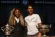 Defending champions Serena Williams, of the U.S, left, and Spain's Rafael Nadal pose during the draw for the French Open Tennis tournament, at the Roland Garros stadium in Paris, Friday, May 23, 2014. The French Open tennis tournament starts Sunday. At left is the women's trophy, at right, the men's trophy. (AP Photo/Michel Euler)