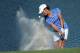 Duke's Celine Boutier blasts from the No. 13 bunker during the NCAA Division 1 Women's Golf Championships played at the University of Georgia Golf Course, Friday, May 24, 2013, in Athens, Ga. (AP Photo/David Tulis)