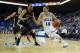LOS ANGELES, CA - NOVEMBER 12: Zach LaVine #14 of the UCLA Bruins drives to the basket past Tommie McCune #23 of the Oakland Golden Grizzlies in the first half at Pauley Pavilion on November 12, 2013 in Los Angeles, California. (Photo by Jeff Gross/Getty Images)