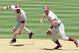 May 25, 2013; Durham, NC, USA; Florida State Seminoles infielder Giovanny Alfonzo (left) backs up teammate Casey Smit (43) on a ground ball during their game against the Virginia Cavaliers during the ACC baseball tournament at Durham Bulls Athletic Park. Virginia won 7-4 in 12 innings. Mandatory Credit: Liz Condo-USA TODAY Sports