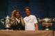 Defending champions Serena Williams, of the U.S, left, and Spain's Rafael Nadal pose during the draw for the French Open Tennis tournament, at the Roland Garros stadium in Paris, Friday, May 23, 2014. The French Open tennis tournament starts Sunday. At left is the women's trophy, at right, the men's trophy. (AP Photo/Michel Euler)