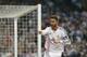Real Madrid's Sergio Ramos celebrates his goal during a Spanish La Liga soccer match between Real Madrid and Valencia at the Santiago Bernabeu stadium in Madrid, Spain, Sunday, May 4, 2014 . (AP Photo/Daniel Ochoa de Olza)
