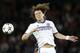Chelsea's David Luiz contests a header during the Champions League quarterfinal first leg soccer match between PSG and Chelsea, at the Parc des Princes stadium, in Paris, Wednesday, April 2, 2014. (AP Photo/Christophe Ena)