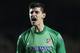 Atletico goalkeeper Thibaut Courtois celebrates as his teammate Atletico's Diego Costa scores his sides second goal from the penalty sport during the Champions League semifinal second leg soccer match between Chelsea and Atletico Madrid at Stamford Bridge stadium in London, Wednesday, April 30, 2014. (AP Photo/Matt Dunham)