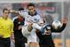 Hamburg's Hakan Calhanoglu of Turkey, left, and Leverkusen's Sidney Sam challenge for the ball during the German first division Bundesliga soccer match between Bayer Leverkusen and Hamburg SV in Leverkusen, Germany, Saturday, Nov. 9, 2013. (AP Photo/Frank Augstein)