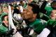ANNAPOLIS, MD - DECEMBER 27: Offensive linesman Garrett Scott #76 of the Marshall Thundering Herd kisses the trophy after defeating the Maryland Terrapins 31-20 to win the 2013 Military Bowl at Navy Marine Corps Memorial Stadium on December 27, 2013 in Annapolis, Maryland. (Photo by Rob Carr/Getty Images)
