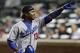 Los Angeles Dodgers shortstop Hanley Ramirez points to fans after hitting a solo home run against the New York Mets during the sixth inning of a baseball game, Wednesday, May 21, 2014, in New York. (AP Photo/Julie Jacobson)