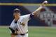 LSU's Kyle Bouman (28) pitches against Arkansas during the first inning at the Southeastern Conference NCAA college baseball tournament on Saturday, May 24, 2014, in Hoover, Ala. (AP Photo/Butch Dill)
