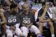 San Antonio Spurs' Tim Duncan, left, Tony Parker, center, and Manu Ginobili, right, sit on the bench during the second half of Game 2 of a Western Conference finals NBA basketball playoff series against the Oklahoma City Thunder, Wednesday, May 21, 2014, in San Antonio. San Antonio won 112-77. (AP Photo/Eric Gay)