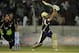Kolkata Knight Riders batsman Yusuf Pathan plays a shot against Somerset during the Champions League Twenty20 cricket match in Hyderabad, India, Sunday, Sept. 25, 2011. (AP Photo/Mahesh Kumar A)