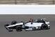 Kurt Busch heads into the first turn on the final day of practice for the Indianapolis 500 IndyCar auto race at the Indianapolis Motor Speedway in Indianapolis, Friday, May 23, 2014. The 98th running of the Indianapolis 500 is Sunday. (AP Photo/Tom Strattman)