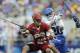 Denver's Jake Nolan looks to pass the ball under pressure from Duke's Charlie Payton in the second half of an NCAA semi-final lacrosse game Saturday, May 24, 2014, in Baltimore. Duke won 15-12.(AP Photo/Gail Burton)