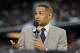 Apr 5, 2014; Arlington, TX, USA; TBS broadcaster Grant Hill on air during the semifinals of the Final Four in the 2014 NCAA Mens Division I Championship tournament between the Florida Gators and Connecticut Huskies at AT&T Stadium. Mandatory Credit: Sean Dougherty-USA TODAY Sports