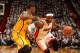 MIAMI, FL - May 24: LeBron James #6 of the Miami Heat handles the ball against Paul George #24 of the Indiana Pacers in Game Three of the Eastern Conference Finals during the 2014 NBA playoffs at the American Airlines Arena in Miami, Florida on May 24, 2014. NOTE TO USER: User expressly acknowledges and agrees that, by downloading and/or using this photograph, user is consenting to the terms and conditions of the Getty Images License Agreement. Mandatory copyright notice: Copyright NBAE 2014 (Photo by Issac Baldizon/NBAE via Getty Images)