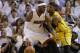 Miami Heat forward LeBron James (6) dribbles pass Indiana Pacers forward Paul George (24) during the first half of Game 3 in the NBA basketball Eastern Conference finals playoff series, Saturday, May 24, 2014, in Miami. (AP Photo/Lynne Sladky)