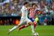 LISBON, PORTUGAL - MAY 24: Gareth Bale of Real Madrid runs through on goal under the watchful eye of Tiago of Club Atletico de Madrid during the UEFA Champions League Final between Real Madrid and Atletico de Madrid at Estadio da Luz on May 24, 2014 in Lisbon, Portugal. (Photo by Alex Livesey/Getty Images)