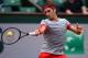 PARIS, FRANCE - MAY 25: Roger Federer of Switzerland returns a shot during his men's singles match against Lukas Lacko of Slovakia on day one of the French Open at Roland Garros on May 25, 2014 in Paris, France. (Photo by Matthias Hangst/Getty Images)