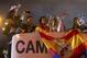Real Madrid's Sergio Ramos, left, Cristiano Ronaldo, second from left and Pepe, center, celebrate with the trophy on an open-top bus in Madrid, Spain, Sunday, May 25, 2014, after their team won the Champions League final soccer match in Lisbon, Portugal by beating Atletico Madrid. (AP Photo/Paul White)