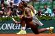 PARIS, FRANCE - MAY 25: Serena Williams of the United States reacts during her women's singles match against Alize Lim of France on day one of the French Open at Roland Garros on May 25, 2014 in Paris, France. (Photo by Matthias Hangst/Getty Images)