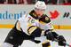 NEWARK, NJ - APRIL 13: Alexander Khokhlachev #76 of the Boston Bruins, playing in his first NHL game, skates against the New Jersey Devils during the game at the Prudential Center on April 13, 2014 in Newark, New Jersey. (Photo by Andy Marlin/NHLI via Getty Images)