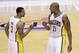 Indiana Pacers guard George Hill, left, and forward David West celebrate late in the fourth quarter of Game 6 of the Eastern Conference semifinal NBA basketball playoff series against the New York Knicks in Indianapolis, Saturday, May 18, 2013. The Pacers defeated the Knicks 106-99 to win the series 4-2. (AP Photo/Michael Conroy)