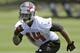 Tampa Bay Buccaneers sixth-round draft pick, wide receiver Robert Herron, runs a drill during NFL football rookie camp Friday, May 16, 2014, in Tampa, Fla. Herron played his college football at Wyoming. (AP Photo/Chris O'Meara)