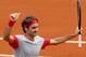 Switzerland's Roger Federer thumbs up after defeating Slovakia's Lukas Lacko in the first round match of the French Open tennis tournament at the Roland Garros stadium, in Paris, France, Sunday, May 25, 2014. Federer won 6-2, 6-4, 6-2. (AP Photo/Darko Vojinovic)