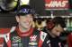 Kurt Busch smiles following practice for Sunday's NASCAR Sprint Cup series Coca-Cola 600 auto race at the Charlotte Motor Speedway in Concord, N.C., Saturday, May 24, 2014. (AP Photo/Gerry Broome)