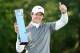 VIRGINIA WATER, ENGLAND - MAY 25: Rory McIlroy of Northern Ireland poses with the trophy following his victory at the end of day four of the BMW PGA Championship at Wentworth on May 25, 2014 in Virginia Water, England. (Photo by Richard Heathcote/Getty Images)