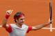 Switzerland's Roger Federer thumbs up after defeating Slovakia's Lukas Lacko in the first round match of the French Open tennis tournament at the Roland Garros stadium, in Paris, France, Sunday, May 25, 2014. Federer won 6-2, 6-4, 6-2. (AP Photo/Darko Vojinovic)