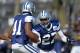 Dallas Cowboys defensive back J.J. Wilcox, right, tries to stop strong safety Eric Frampton during NFL football training camp on Friday, July 26, 2013, in Oxnard, Calif. Wilcox did not hesitate when the Cowboys rookie was asked if he knew who Bill Bates was.
