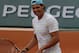 Defending champion Spain's Rafael Nadal smiles during a training session for the French Open tennis tournament, at the Roland Garros stadium in Paris, Friday, May 23, 2014. The French Open tennis championship will start Sunday. (AP Photo/Bertrand Combaldieu)