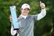 VIRGINIA WATER, ENGLAND - MAY 25: Rory McIlroy of Northern Ireland poses with the trophy following his victory at the end of day four of the BMW PGA Championship at Wentworth on May 25, 2014 in Virginia Water, England. (Photo by Richard Heathcote/Getty Images)