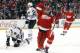 Detroit Red Wings defenseman Kyle Quincey, right, celebrates his goal against Chicago Blackhawks goalie Corey Crawford in the second period of an NHL hockey game Wednesday, Jan. 22, 2014, in Detroit. (AP Photo/Paul Sancya)