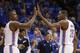 Oklahoma City Thunder forward Serge Ibaka (9) and forward Kevin Durant (35) exchange high-fives in the fourth quarter of Game 3 of an NBA basketball playoff series in the Western Conference finals against the San Antonio Spurs, Sunday, May 25, 2014, in Oklahoma City. Oklahoma City won 106-97. Durant scored 25 points and 10 rebounds. Ibaka had 15 points. (AP Photo/Sue Ogrocki)