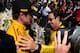 INDIANAPOLIS, IN - MAY 25: Ryan Hunter-Reay (left) driver of the #28 Andretti Autosport Dallara Honda hugs Helio Castroneves of Brazil driver of the #3 Team Penske Dallara Chevrolet after the 98th running of the Indianapolis 500 mile race at the Indianapolis Motor Speedway on May 25, 2014 in Indianapolis, Indiana. (Photo by Robert Laberge/Getty Images)
