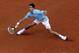 Serbia's Novak Djokovic returns the ball to Portugal's Joao Sousa during their first round match of the French Open tennis tournament at the Roland Garros stadium, in Paris, France, Monday, May 26, 2014. (AP Photo/Michel Euler)