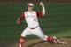 FILE - In this June 20, 2013 file photo, North Carolina State pitcher Carlos Rodon throws against North Carolina during an NCAA College World Series elimination baseball game in Omaha, Neb. (AP Photo/Nati Harnik, File)