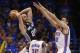San Antonio Spurs guard Manu Ginobili (20) looks for a pass in front of Oklahoma City Thunder guard Reggie Jackson (15) and center Steven Adams (12) in the second quarter of Game 3 of an NBA basketball playoff series in the Western Conference finals, Sunday, May 25, 2014, in Oklahoma City. (AP Photo/Sue Ogrocki)