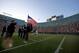 The American flag is presented before a game between the Green Bay Packers and the Buffalo Bills in an NFL exhibition football game Saturday, Aug. 22, 2009, in Green Bay, Wis. (AP Photo/Andy Manis)